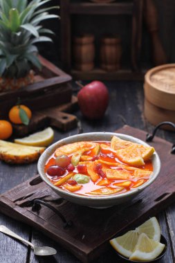 Asinan is a pickled vegetable or fruit dish, commonly found in Indonesia. Asin, Indonesian for 