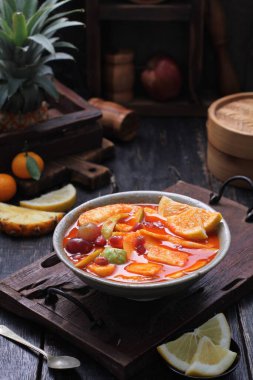 Asinan is a pickled vegetable or fruit dish, commonly found in Indonesia. Asin, Indonesian for 