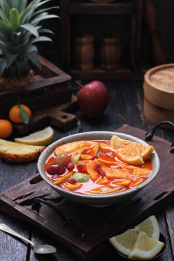 Asinan is a pickled vegetable or fruit dish, commonly found in Indonesia. Asin, Indonesian for 