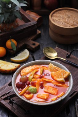 Asinan is a pickled vegetable or fruit dish, commonly found in Indonesia. Asin, Indonesian for 