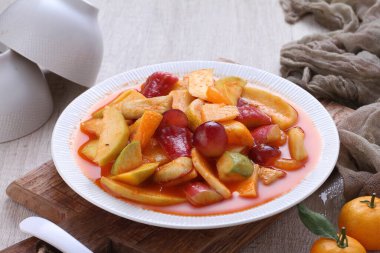 Asinan is a pickled vegetable or fruit dish, commonly found in Indonesia. Asin, Indonesian for 