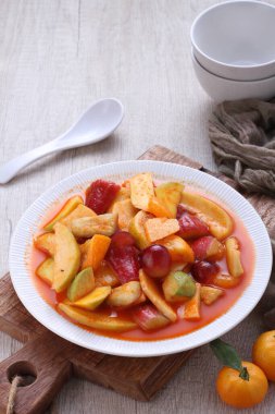 Asinan is a pickled vegetable or fruit dish, commonly found in Indonesia. Asin, Indonesian for 