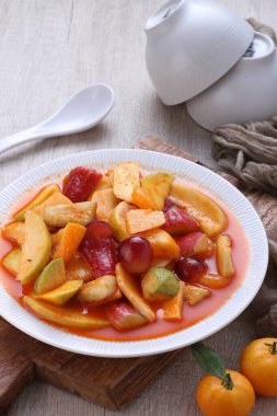 Asinan is a pickled vegetable or fruit dish, commonly found in Indonesia. Asin, Indonesian for 