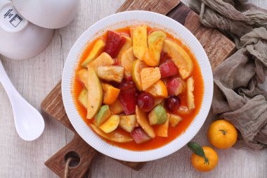 Asinan is a pickled vegetable or fruit dish, commonly found in Indonesia. Asin, Indonesian for 