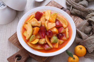 Asinan is a pickled vegetable or fruit dish, commonly found in Indonesia. Asin, Indonesian for 