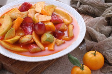 Asinan is a pickled vegetable or fruit dish, commonly found in Indonesia. Asin, Indonesian for 