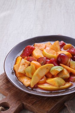 Asinan is a pickled vegetable or fruit dish, commonly found in Indonesia. Asin, Indonesian for 