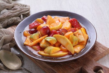 Asinan is a pickled vegetable or fruit dish, commonly found in Indonesia. Asin, Indonesian for 