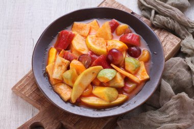 Asinan is a pickled vegetable or fruit dish, commonly found in Indonesia. Asin, Indonesian for 