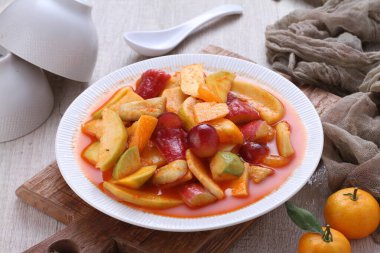 Asinan is a pickled vegetable or fruit dish, commonly found in Indonesia. Asin, Indonesian for 