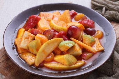 Asinan is a pickled vegetable or fruit dish, commonly found in Indonesia. Asin, Indonesian for 