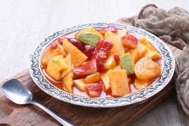 Asinan is a pickled vegetable or fruit dish, commonly found in Indonesia. Asin, Indonesian for 