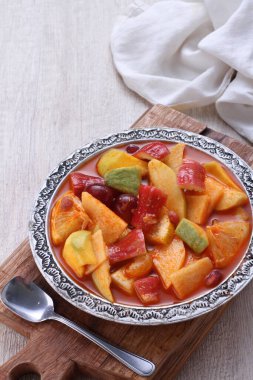 Asinan is a pickled vegetable or fruit dish, commonly found in Indonesia. Asin, Indonesian for 