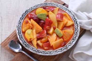 Asinan is a pickled vegetable or fruit dish, commonly found in Indonesia. Asin, Indonesian for 