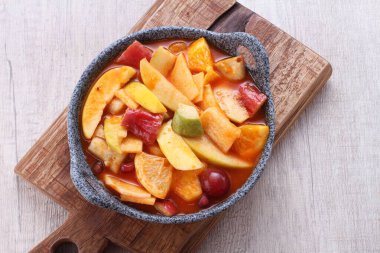 Asinan is a pickled vegetable or fruit dish, commonly found in Indonesia. Asin, Indonesian for 