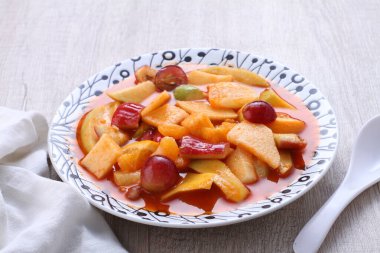 Asinan is a pickled vegetable or fruit dish, commonly found in Indonesia. Asin, Indonesian for 