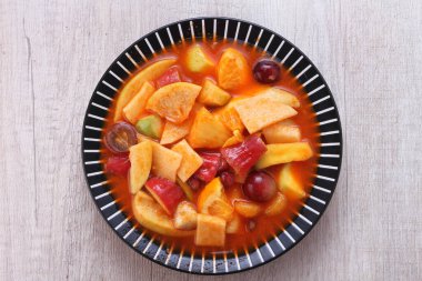 Asinan is a pickled vegetable or fruit dish, commonly found in Indonesia. Asin, Indonesian for 