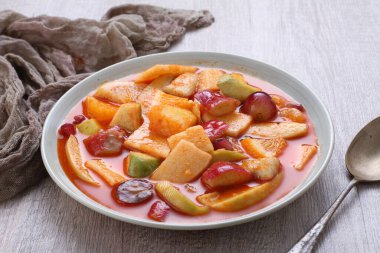 Asinan is a pickled vegetable or fruit dish, commonly found in Indonesia. Asin, Indonesian for 