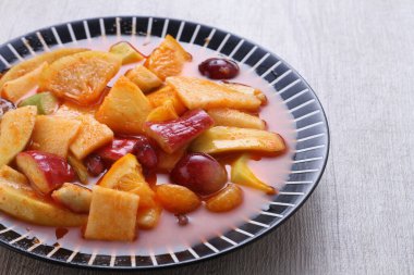 Asinan is a pickled vegetable or fruit dish, commonly found in Indonesia. Asin, Indonesian for 