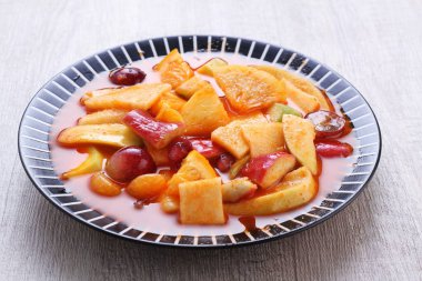 Asinan is a pickled vegetable or fruit dish, commonly found in Indonesia. Asin, Indonesian for 
