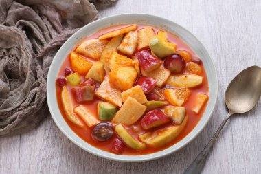 Asinan is a pickled vegetable or fruit dish, commonly found in Indonesia. Asin, Indonesian for 