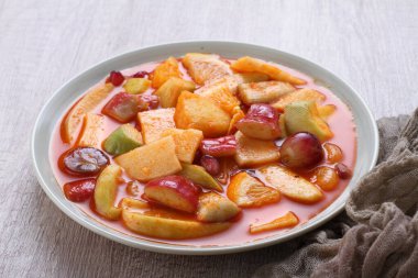 Asinan is a pickled vegetable or fruit dish, commonly found in Indonesia. Asin, Indonesian for 