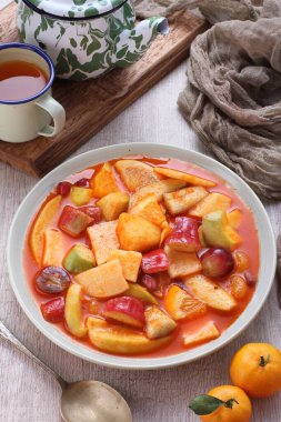 Asinan is a pickled vegetable or fruit dish, commonly found in Indonesia. Asin, Indonesian for 