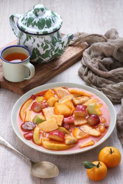 Asinan is a pickled vegetable or fruit dish, commonly found in Indonesia. Asin, Indonesian for 