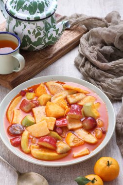 Asinan is a pickled vegetable or fruit dish, commonly found in Indonesia. Asin, Indonesian for 