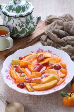 Asinan is a pickled vegetable or fruit dish, commonly found in Indonesia. Asin, Indonesian for 