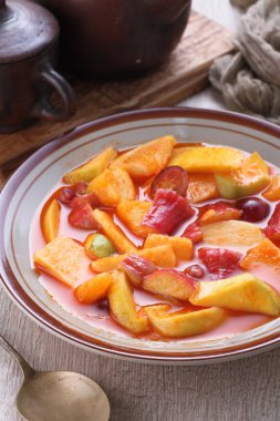 Asinan is a pickled vegetable or fruit dish, commonly found in Indonesia. Asin, Indonesian for 