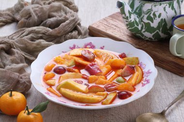 Asinan is a pickled vegetable or fruit dish, commonly found in Indonesia. Asin, Indonesian for 