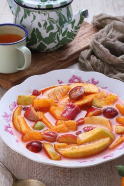 Asinan is a pickled vegetable or fruit dish, commonly found in Indonesia. Asin, Indonesian for 