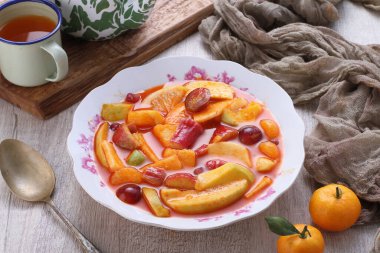 Asinan is a pickled vegetable or fruit dish, commonly found in Indonesia. Asin, Indonesian for 