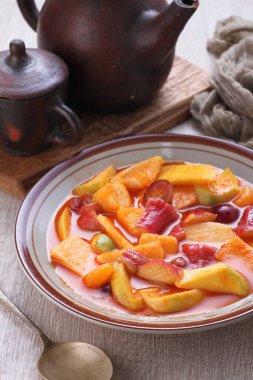 Asinan is a pickled vegetable or fruit dish, commonly found in Indonesia. Asin, Indonesian for 