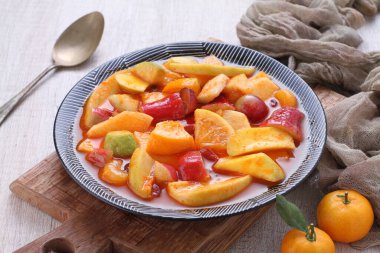 Asinan is a pickled vegetable or fruit dish, commonly found in Indonesia. Asin, Indonesian for 