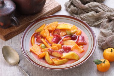 Asinan is a pickled vegetable or fruit dish, commonly found in Indonesia. Asin, Indonesian for 