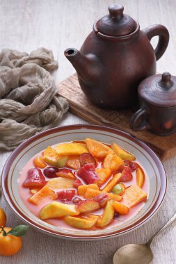 Asinan is a pickled vegetable or fruit dish, commonly found in Indonesia. Asin, Indonesian for 