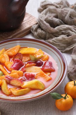 Asinan is a pickled vegetable or fruit dish, commonly found in Indonesia. Asin, Indonesian for 