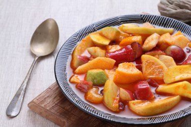 Asinan is a pickled vegetable or fruit dish, commonly found in Indonesia. Asin, Indonesian for 