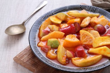 Asinan is a pickled vegetable or fruit dish, commonly found in Indonesia. Asin, Indonesian for 