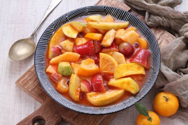 Asinan is a pickled vegetable or fruit dish, commonly found in Indonesia. Asin, Indonesian for 