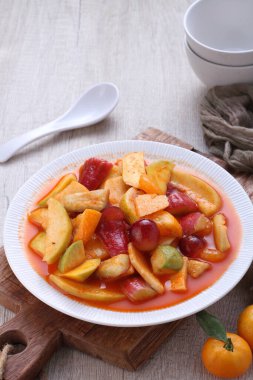 Asinan is a pickled vegetable or fruit dish, commonly found in Indonesia. Asin, Indonesian for 
