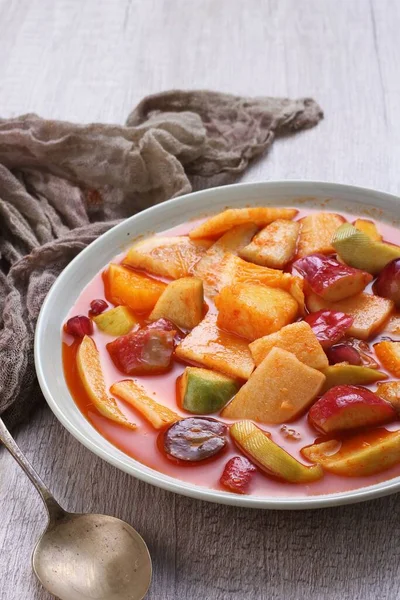 Asinan is a pickled vegetable or fruit dish, commonly found in Indonesia. Asin, Indonesian for 