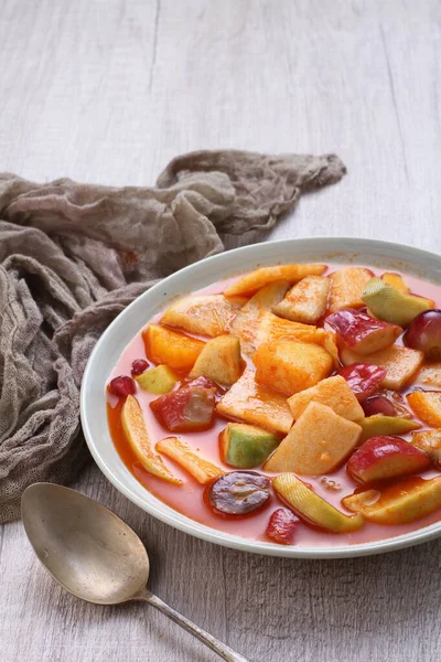 Asinan is a pickled vegetable or fruit dish, commonly found in Indonesia. Asin, Indonesian for 