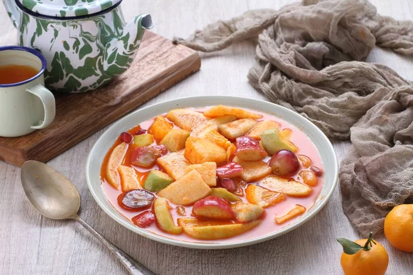 Asinan is a pickled vegetable or fruit dish, commonly found in Indonesia. Asin, Indonesian for 