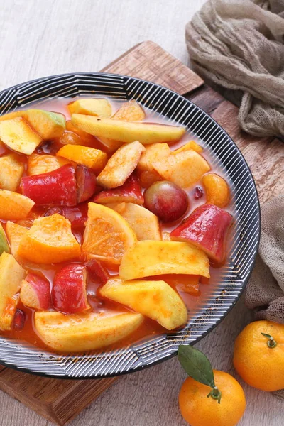 Asinan is a pickled vegetable or fruit dish, commonly found in Indonesia. Asin, Indonesian for 