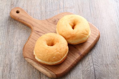 Donuts are fried confectionery, made from wheat flour batter, granulated sugar, egg yolks, baker's yeast, and butter. 