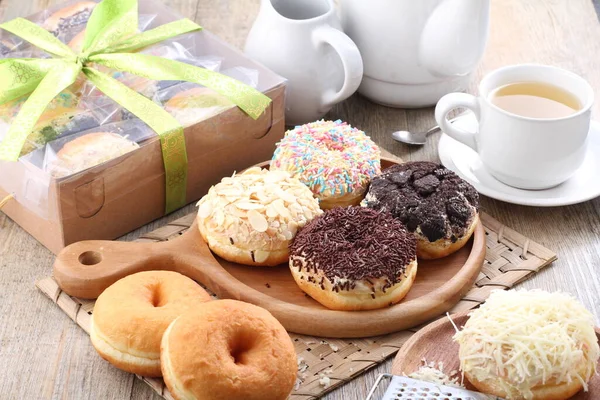 stock image Donuts are fried confectionery, made from wheat flour batter, granulated sugar, egg yolks, baker's yeast, and butter. 