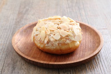 Donuts are fried confectionery, made from wheat flour batter, granulated sugar, egg yolks, baker's yeast, and butter